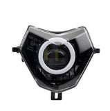 LED RGBW motorcycle headlight with Angel Eye feature, black and clear lens with white trim, designed for Sherco motorcycles.